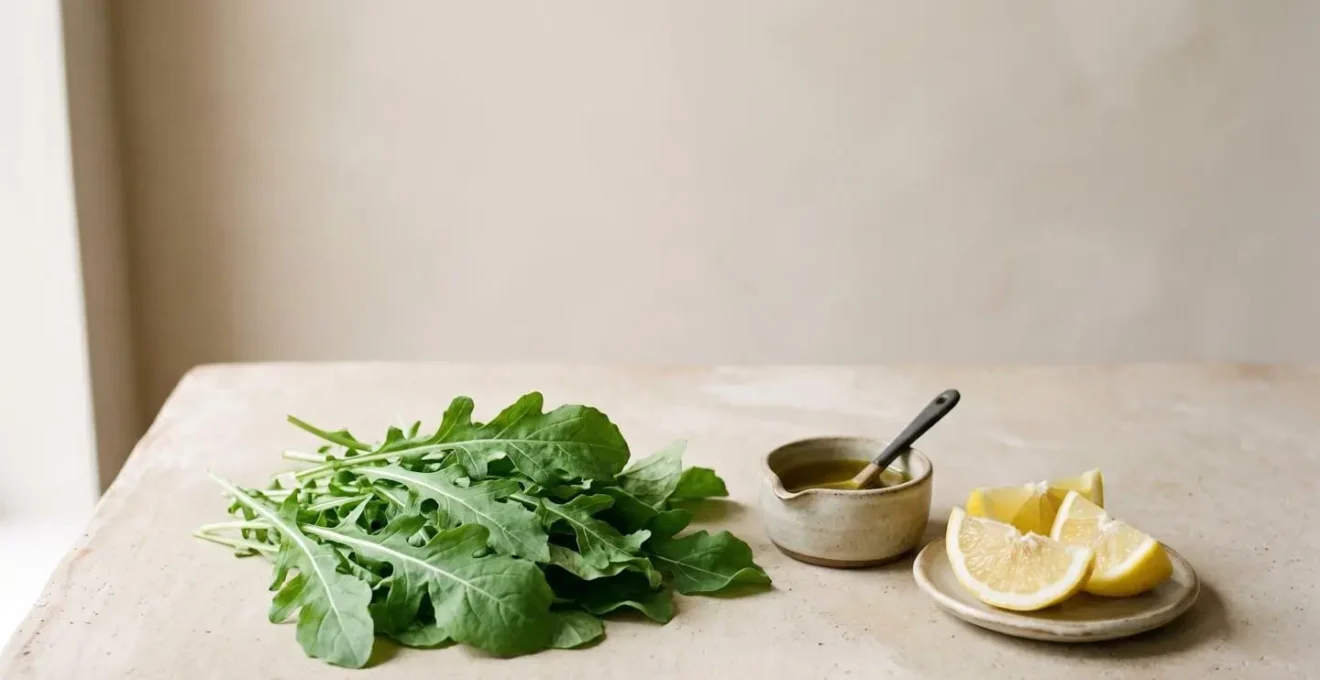 Fresh arugula leaves arranged as a pre-meal appetizer highlighting bitter greens for digestion and nitric oxide production