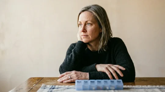 Patient navigating 12-week intensive medical treatment protocol with support and determination